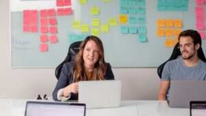 Collaborative colleagues at happy workplace with pre employment background screening