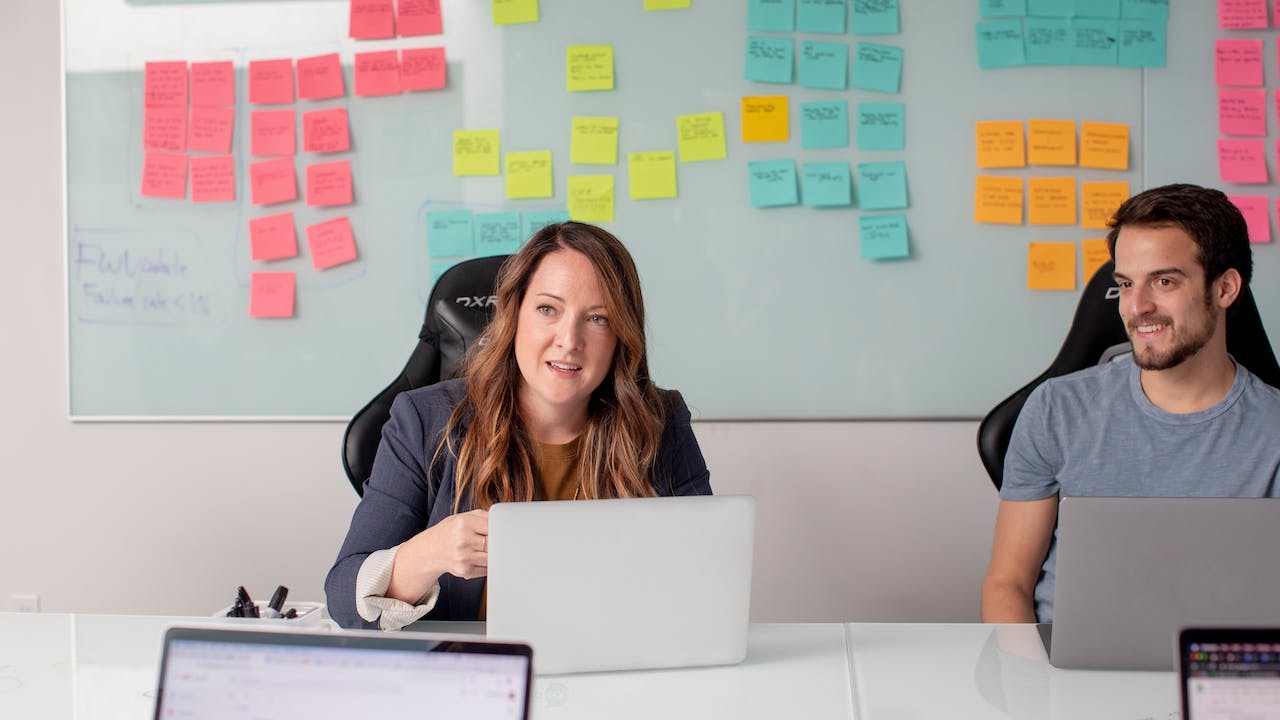 Collaborative colleagues at happy workplace with pre employment background screening