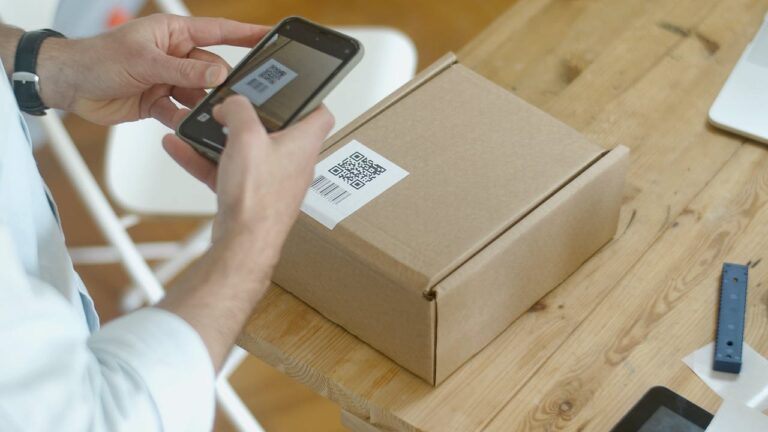 Gig worker scanning parcel authorized to work with online background check
