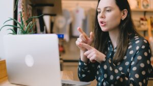 Online interview candidate on video call showing how the hiring process has changed and how you can adapt