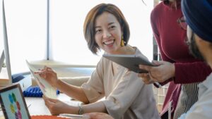 Diverse employees from different business departments showing how background checks benefit different teams