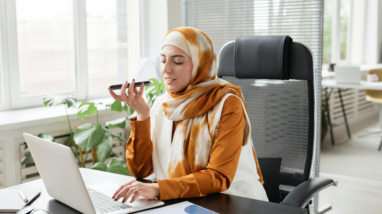 International recruiter calling candidate on phone from office
