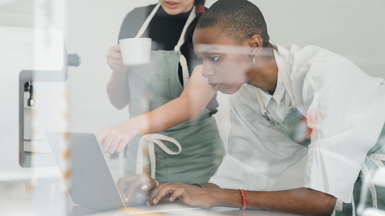 Small business owners with spreadsheets that are holding their business back