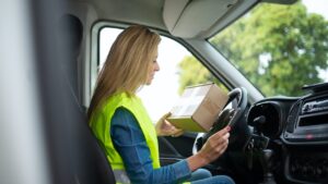 Female delivery driver with a driver's abstract in Ontario for work