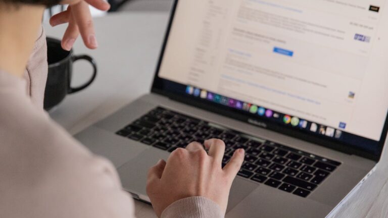 Hiring manager performing online background check to show how background checks work