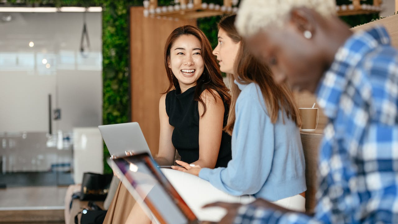 Happy employee using online background check for better candidate experience