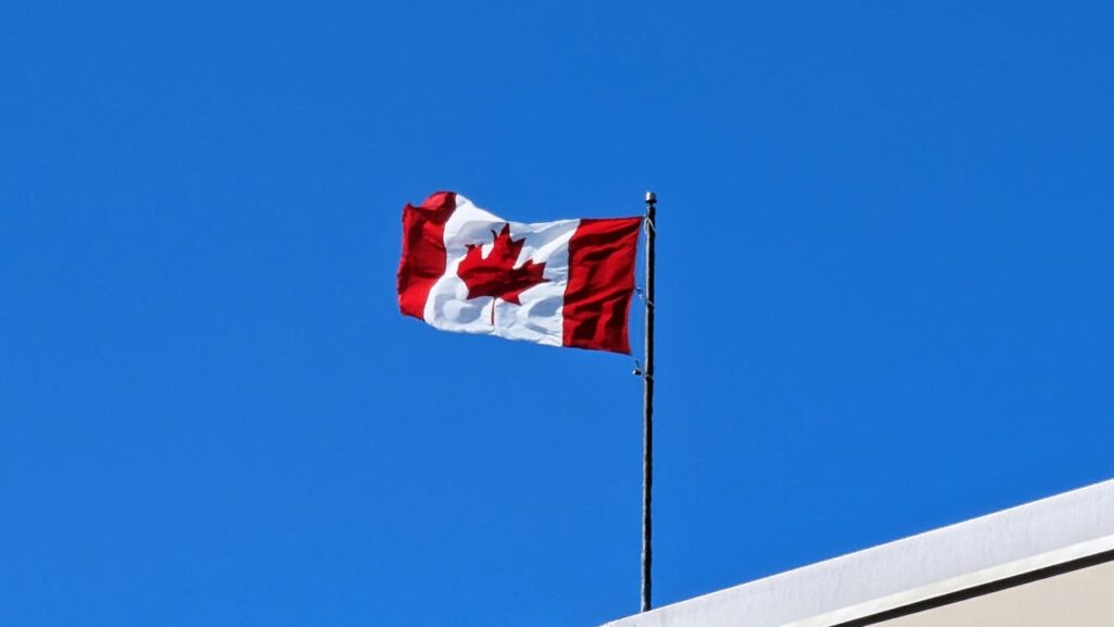 Canadian flag flying in Halifax, Nova Scotia Representing Background Check Halifax