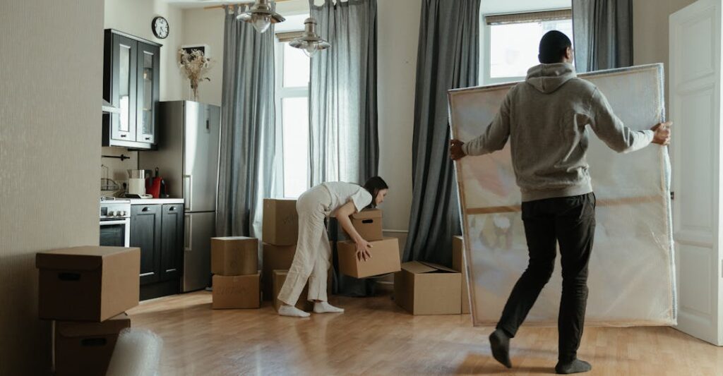 Tenants moving into rental property signifying background screening for Canadian property management