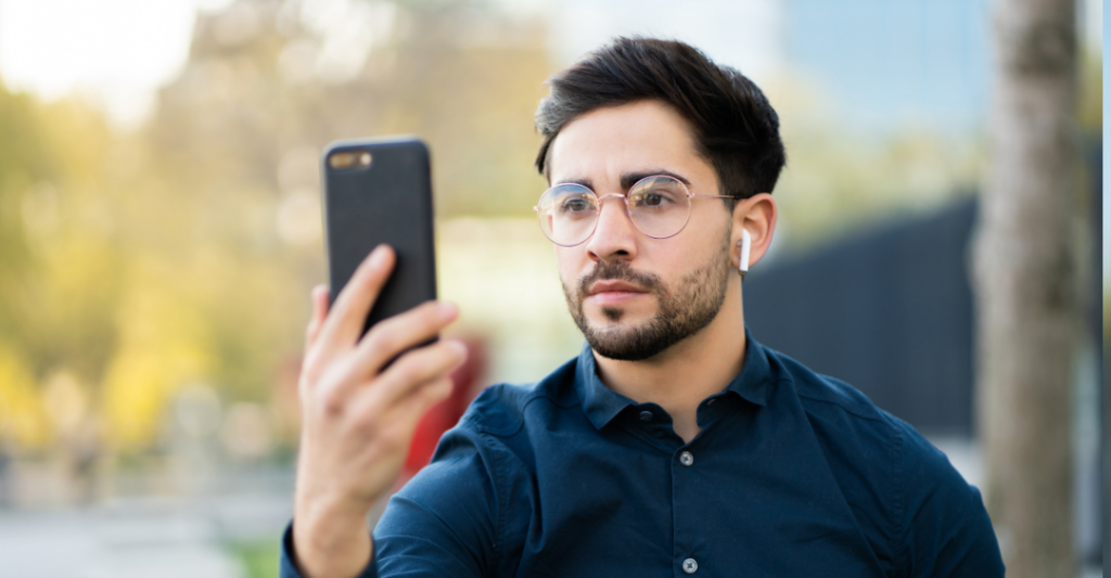 Man using Certn ID on smartphone to verify identity and prevent fraud