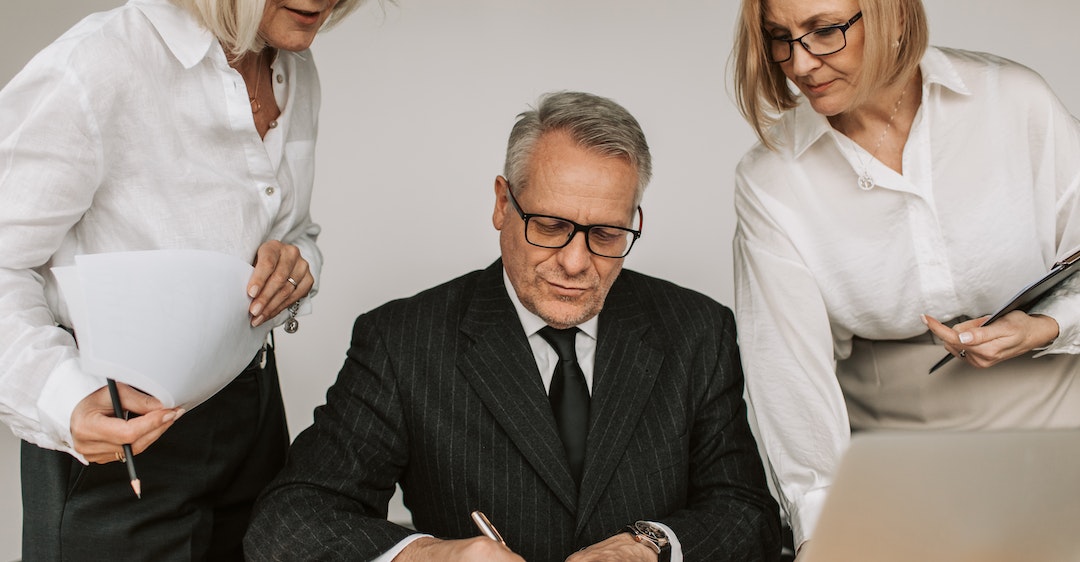 UK-director-colleagues-reviewing-director-checks