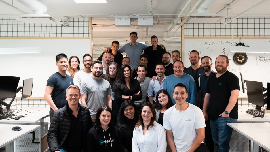 Certn team celebrating choosing the best background screening vendor at Certn office